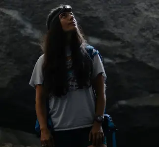 Coros Nomad worn during a cave hike in low-light conditions