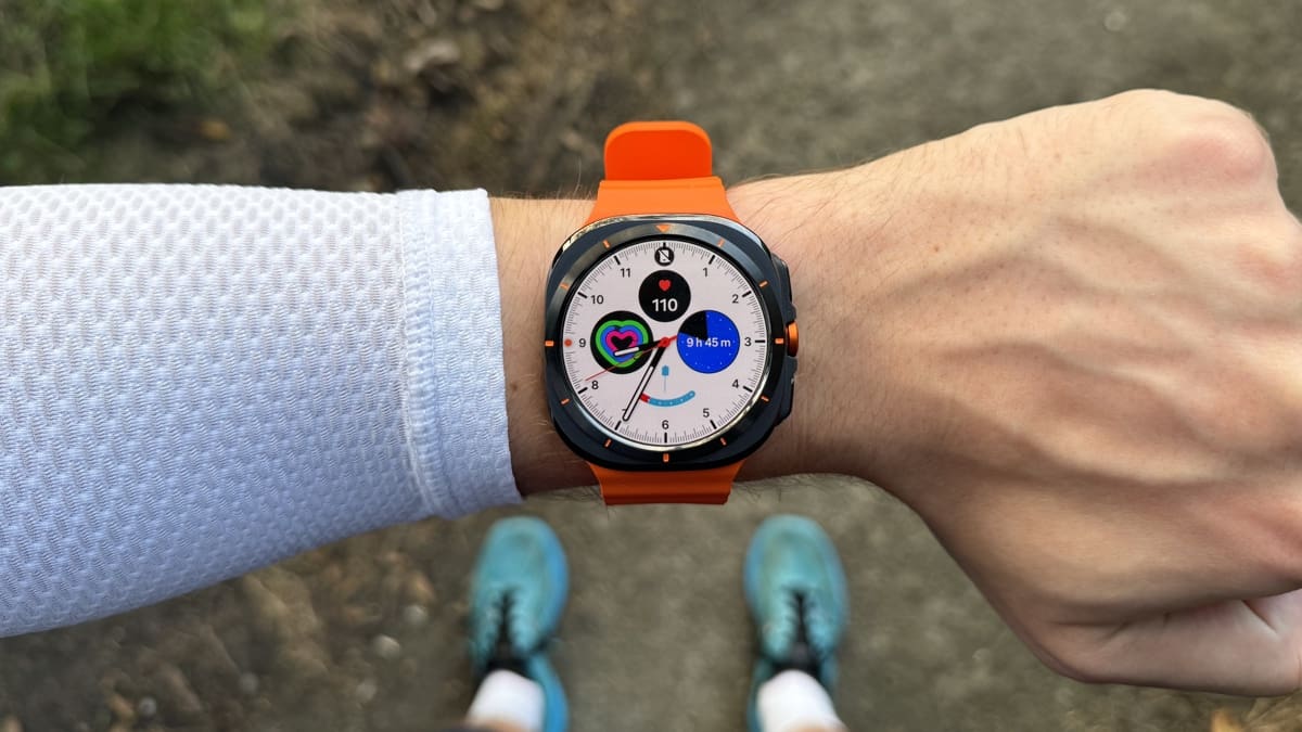 Samsung Galaxy Watch Ultra on wrist outdoors with orange band