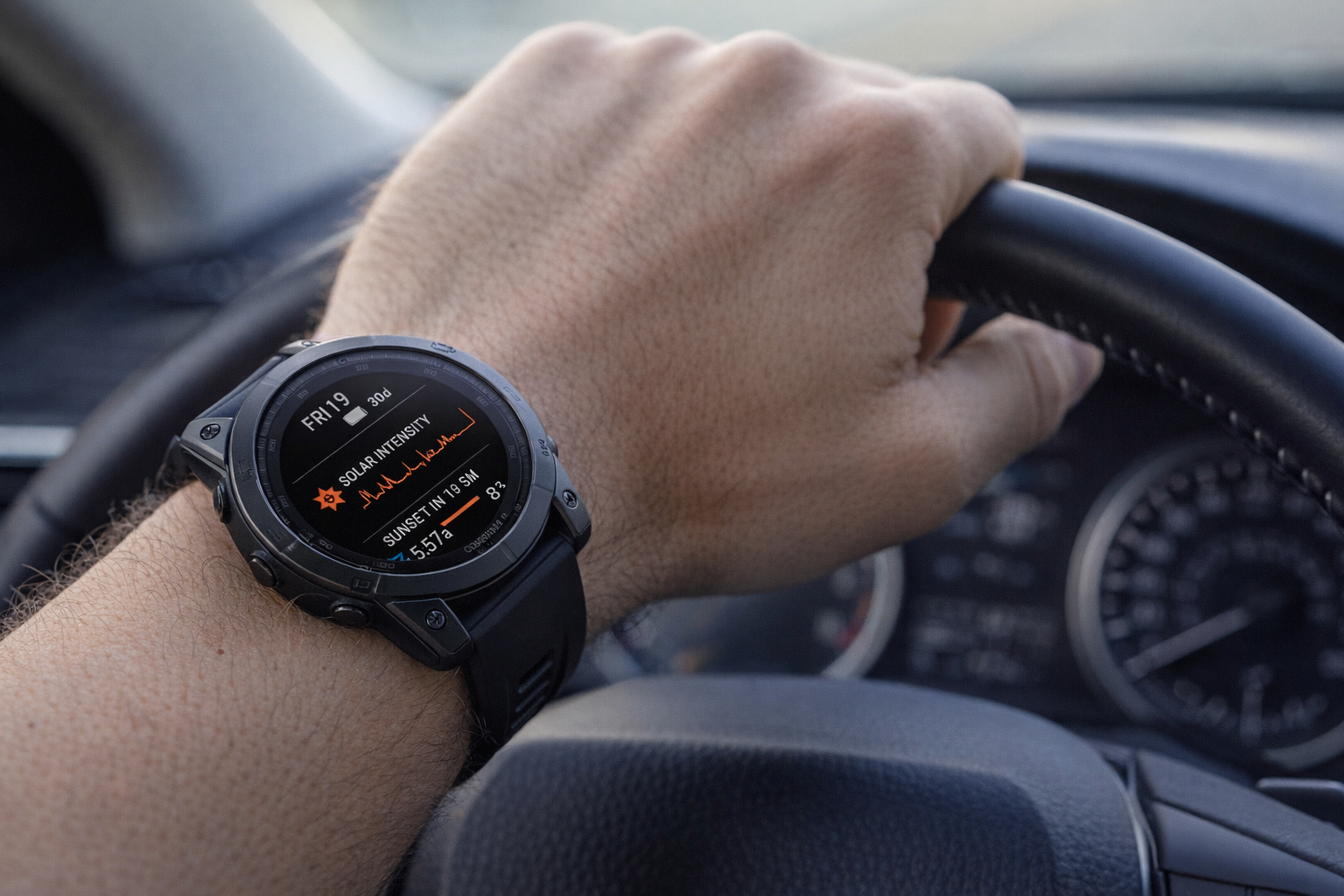 Garmin Fenix 7 on wrist showing solar intensity data while driving