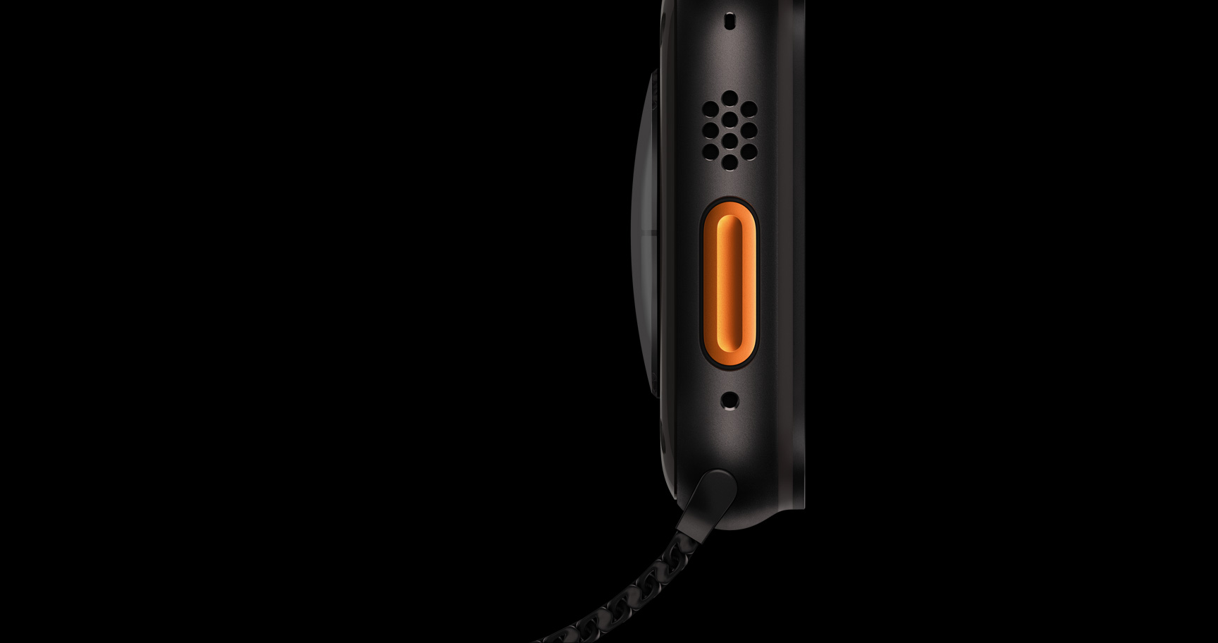 Apple Watch Ultra 3 Action Button close-up on dark titanium