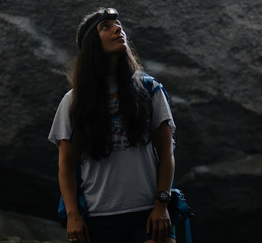 Coros Nomad worn during a cave hike in low-light conditions