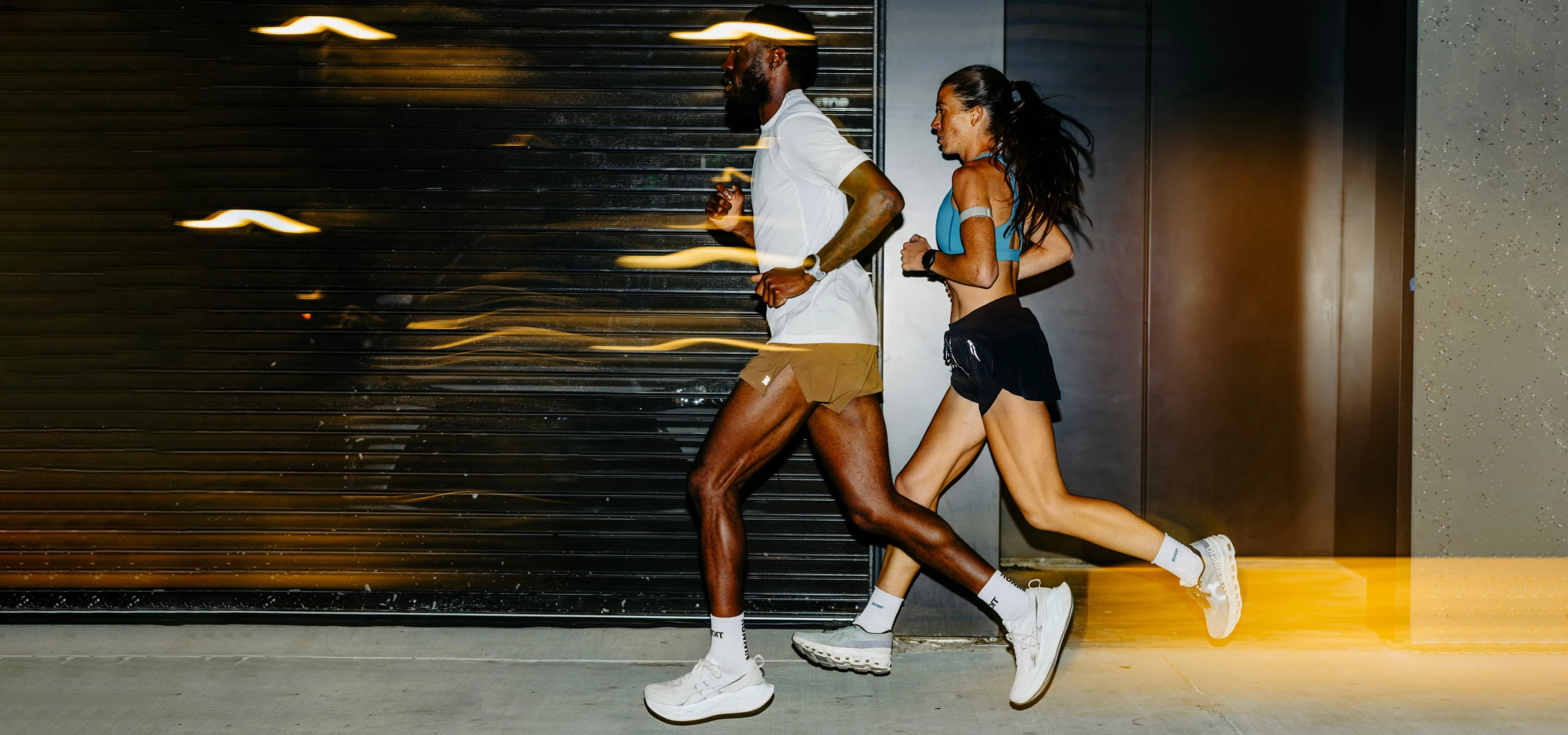 Runners wearing COROS PACE Pro