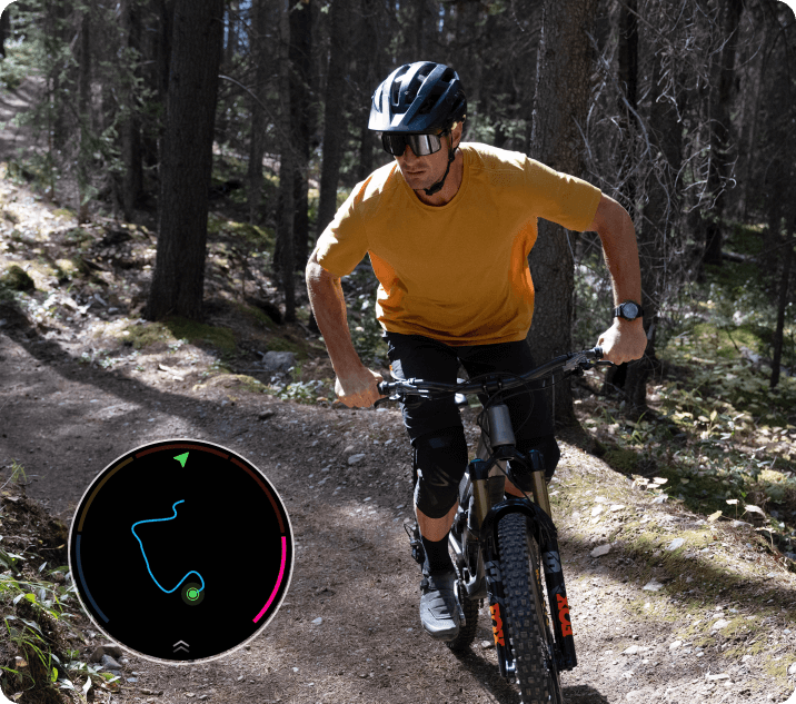 Mountain biker on forest trail with TicWatch Atlas GPS route tracking overlay