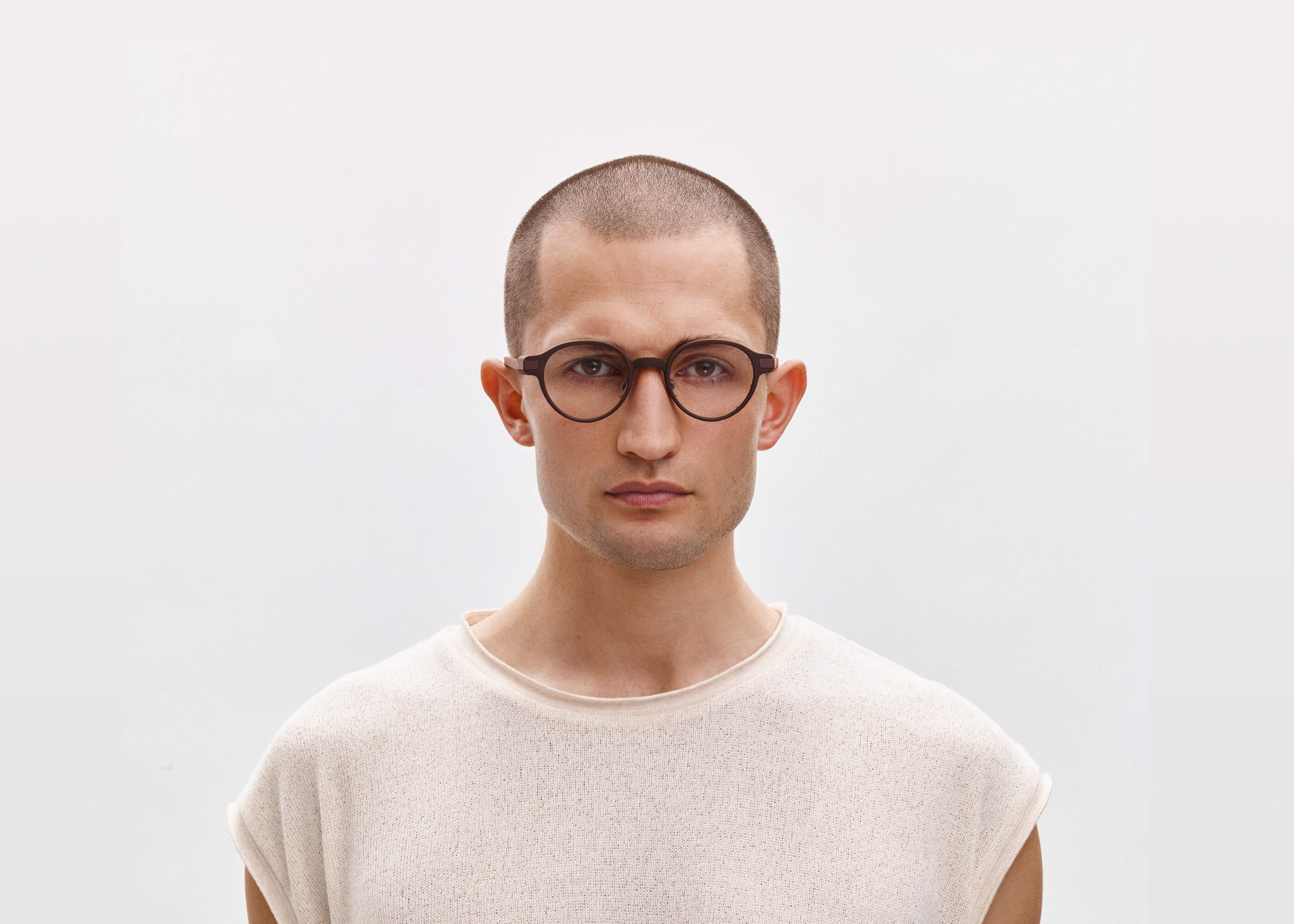 Even Realities G1 smart glasses worn by male model — front facing, clear lenses