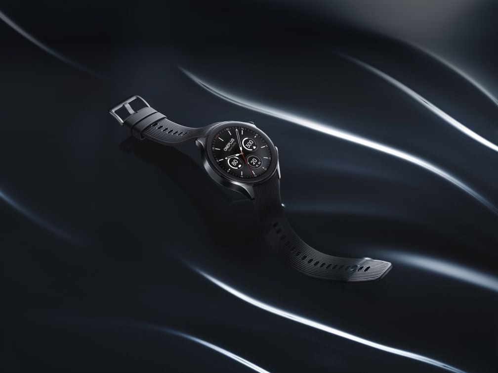 OnePlus Watch 2 in black colorway with dramatic studio lighting